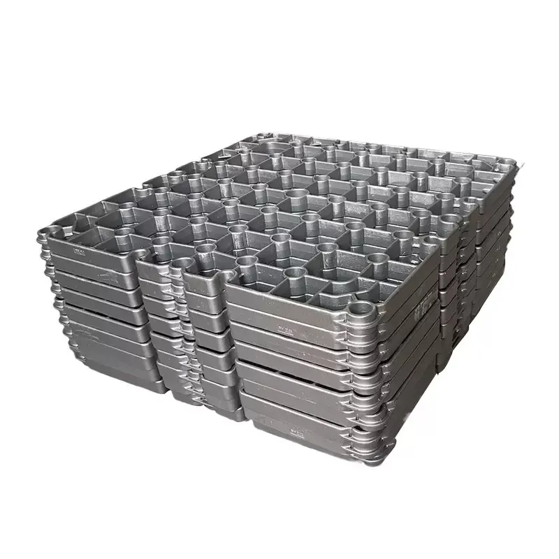 Stacked cast furnace trays with open-grid load-support geometry