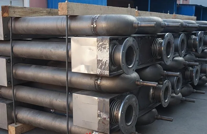 Fabricated radiant tube assemblies with welded branches and flanges