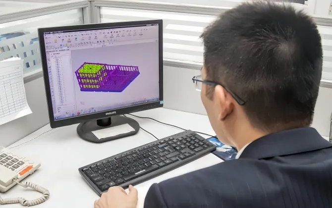 Engineer reviewing the geometry of a furnace component